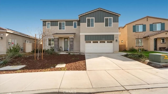 35461 Alexandria Way, Beaumont, CA 92223 - view of front facade with concrete driveway, an attached garage, stucco siding, and board and batten siding