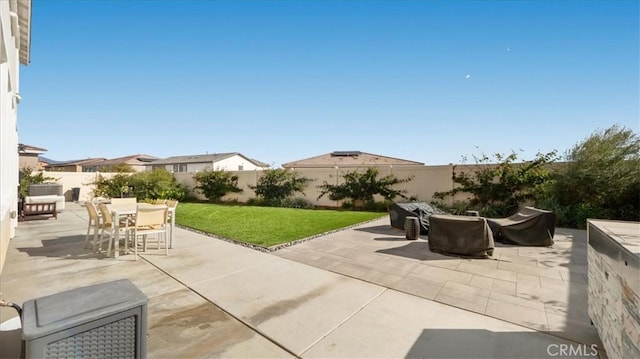 view of patio featuring outdoor dining area