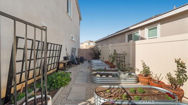 35461 Alexandria Way, Beaumont, CA 92223 - fenced backyard with a vegetable garden