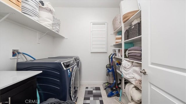 35461 Alexandria Way, Beaumont, CA 92223 - laundry area with washing machine and clothes dryer, tile patterned floors, and baseboards