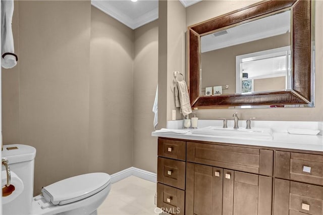 half bath featuring vanity, toilet, crown molding, and baseboards