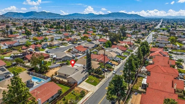 drone / aerial view with a residential view and a mountain view