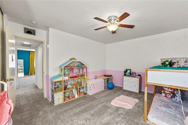 9341 E Shadowood Dr Unit E, Montclair, CA 91763 - recreation room featuring carpet flooring and a ceiling fan