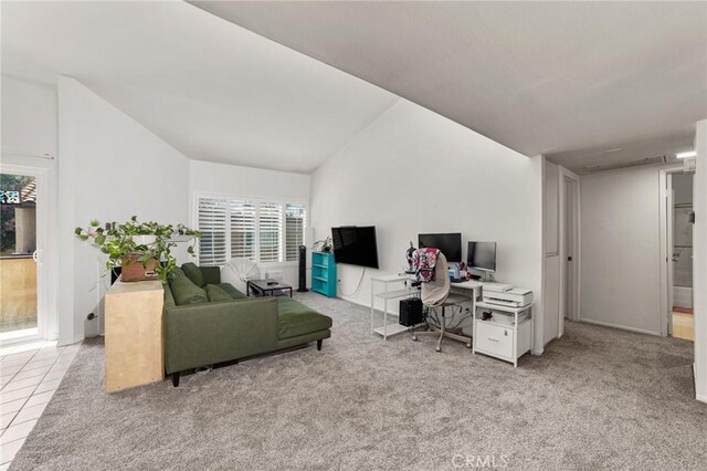 9341 E Shadowood Dr Unit E, Montclair, CA 91763 - office area featuring vaulted ceiling, healthy amount of natural light, and light colored carpet