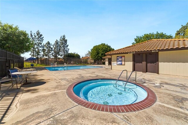 9341 E Shadowood Dr Unit E, Montclair, CA 91763 - community pool featuring a community hot tub and a patio area