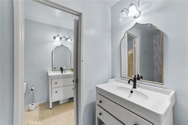 9341 E Shadowood Dr Unit E, Montclair, CA 91763 - full bath with vanity, toilet, and tile patterned floors