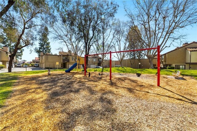 9341 E Shadowood Dr Unit E, Montclair, CA 91763 - community play area featuring a residential view