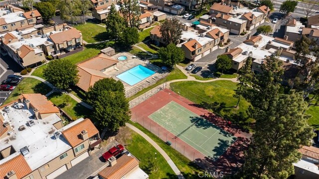 9341 E Shadowood Dr Unit E, Montclair, CA 91763 - aerial overview of property's location featuring nearby suburban area and a pool area