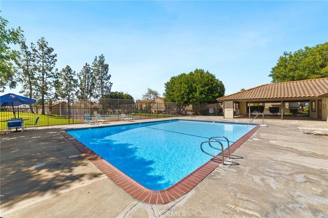 9341 E Shadowood Dr Unit E, Montclair, CA 91763 - community pool featuring a patio