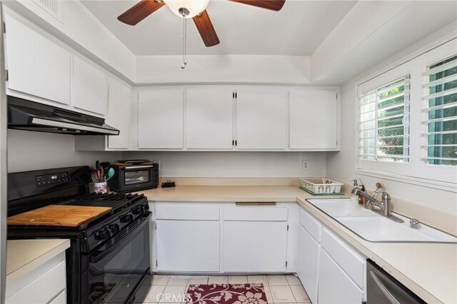 9341 E Shadowood Dr Unit E, Montclair, CA 91763 - kitchen featuring under cabinet range hood, black gas range oven, a sink, stainless steel dishwasher, and a ceiling fan