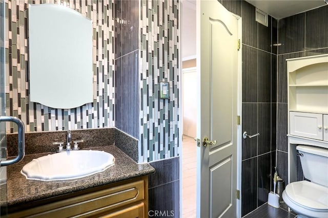 2634 Blandford Dr, Rowland Heights, CA 91748 - bathroom with vanity, tile walls, toilet, and visible vents