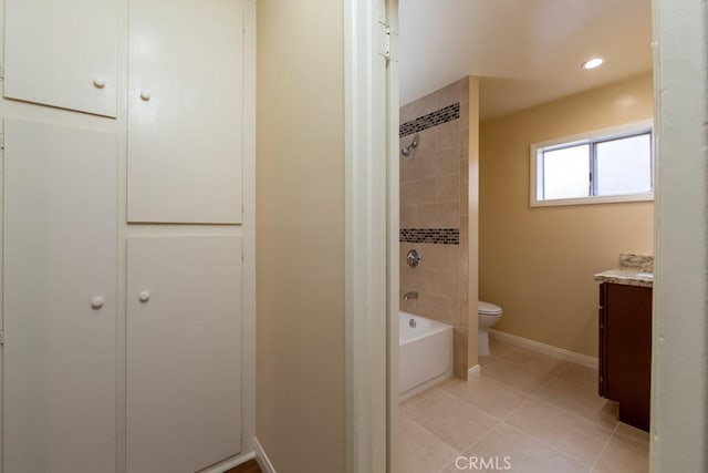 1271 E 7th St, Long Beach, CA 90813 - bathroom featuring toilet, baseboards, tile patterned flooring, vanity, and washtub / shower combination