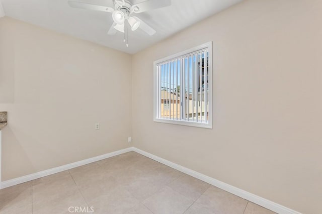 1271 E 7th St, Long Beach, CA 90813 - spare room featuring baseboards, ceiling fan, and light tile patterned flooring