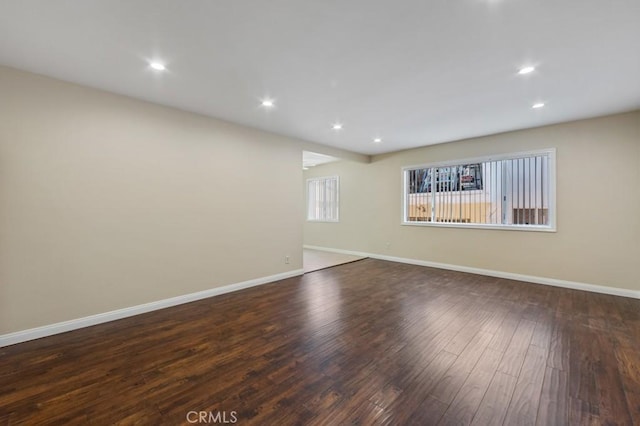 1271 E 7th St, Long Beach, CA 90813 - unfurnished room with baseboards, recessed lighting, and dark wood-type flooring