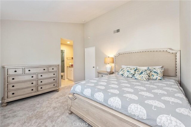 27441 Abanico, Mission Viejo, CA 92691 - carpeted bedroom with ensuite bath, visible vents, and high vaulted ceiling