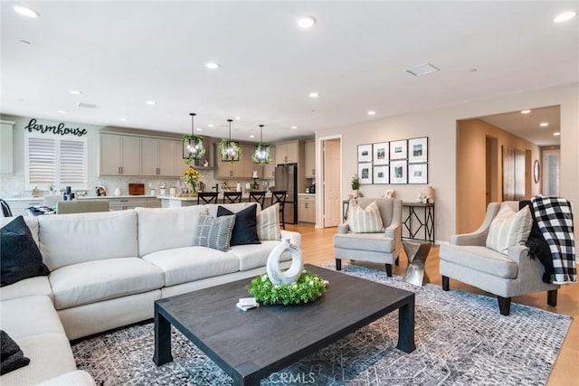 6288 Barb Way, Jurupa Valley, CA 92509 - living room with light wood finished floors and recessed lighting