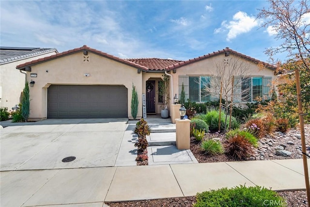 6288 Barb Way, Jurupa Valley, CA 92509 - mediterranean / spanish home with driveway, stucco siding, a garage, and a tile roof