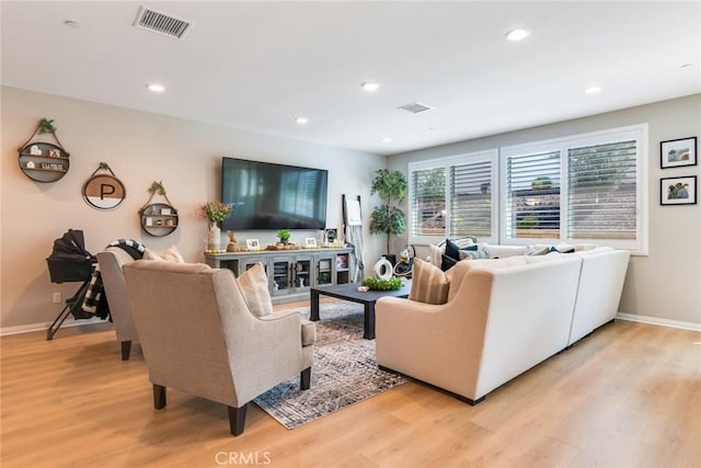6288 Barb Way, Jurupa Valley, CA 92509 - living area with light wood-style floors, baseboards, and recessed lighting