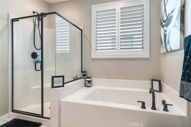 6288 Barb Way, Jurupa Valley, CA 92509 - bathroom featuring a garden tub and a stall shower