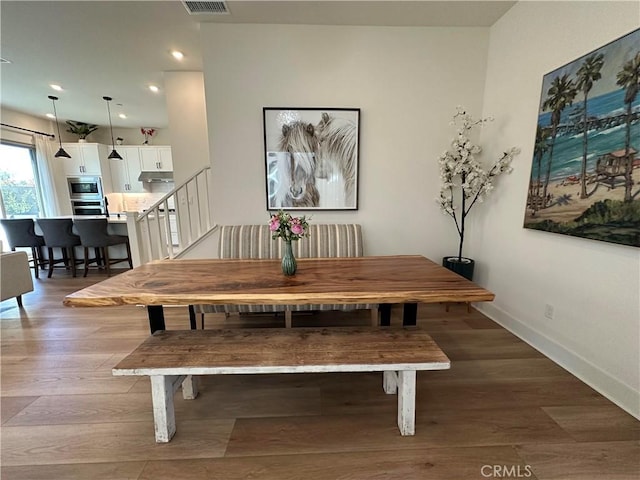 31937 Via Encima, San Juan Capistrano, CA 92675 - dining room with light wood finished floors, recessed lighting, stairs, and baseboards