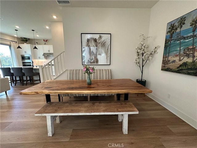 31937 Via Encima, San Juan Capistrano, CA 92675 - dining space with light wood-style flooring, recessed lighting, and stairway