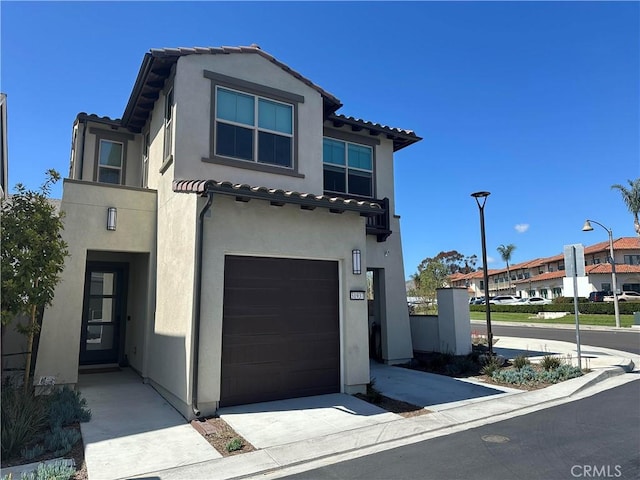 31937 Via Encima, San Juan Capistrano, CA 92675 - view of front of house with stucco siding, a tile roof, and an attached garage