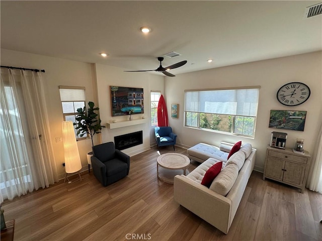 31937 Via Encima, San Juan Capistrano, CA 92675 - living area featuring a fireplace, wood finished floors, recessed lighting, a ceiling fan, and baseboards