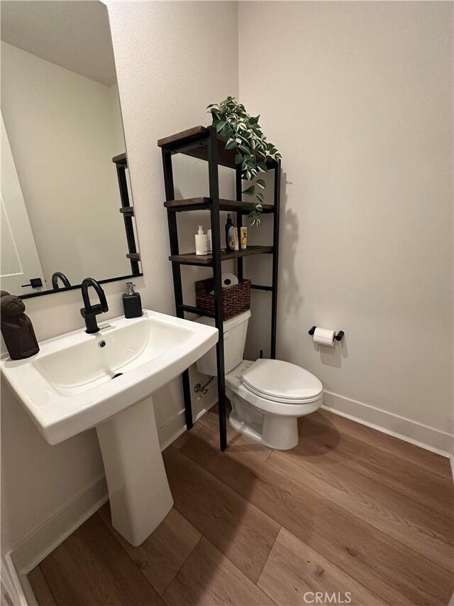 31937 Via Encima, San Juan Capistrano, CA 92675 - half bathroom featuring wood finished floors and toilet
