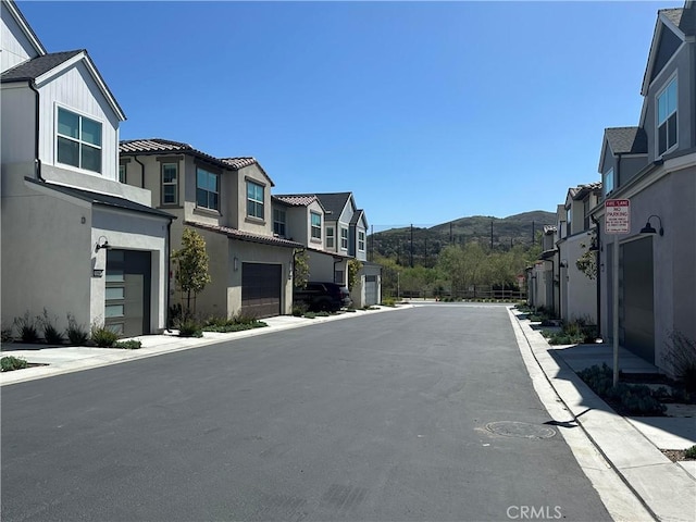 31937 Via Encima, San Juan Capistrano, CA 92675 - view of asphalt street with a residential view and a mountain view