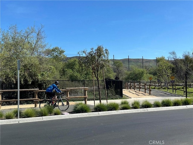 31937 Via Encima, San Juan Capistrano, CA 92675 - view of property's community featuring fence and a mountain view