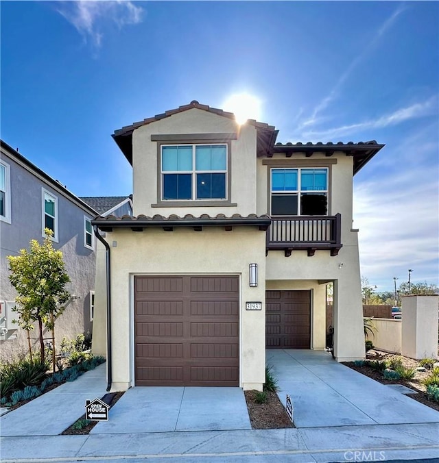 31937 Via Encima, San Juan Capistrano, CA 92675 - view of front of house featuring a garage, stucco siding, driveway, and a tiled roof