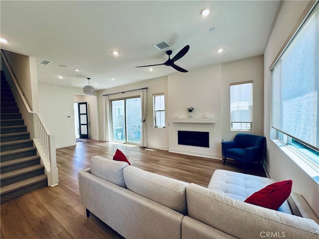 31937 Via Encima, San Juan Capistrano, CA 92675 - living area featuring wood finished floors, stairs, a fireplace, a ceiling fan, and recessed lighting