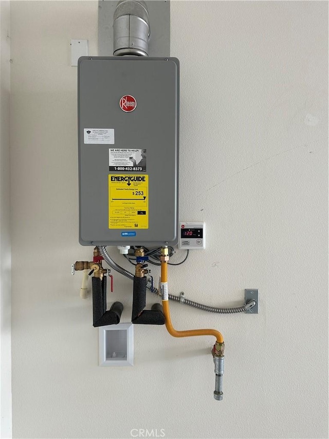31937 Via Encima, San Juan Capistrano, CA 92675 - utility room featuring tankless water heater
