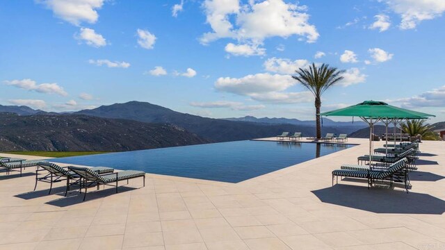 24949 Thunder Mountain Rd, Ramona, CA 92065 - view of pool with a mountain view and a patio