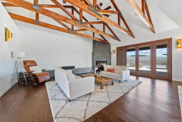 24949 Thunder Mountain Rd, Ramona, CA 92065 - living room with a tiled fireplace, beam ceiling, high vaulted ceiling, and hardwood / wood-style flooring