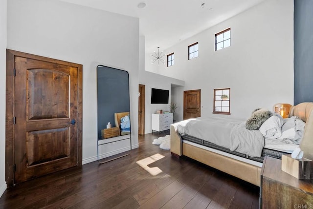24949 Thunder Mountain Rd, Ramona, CA 92065 - bedroom featuring dark wood finished floors, a notable chandelier, and baseboards