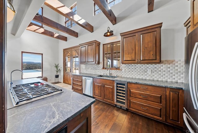 24949 Thunder Mountain Rd, Ramona, CA 92065 - kitchen with beverage cooler, beam ceiling, a sink, stainless steel appliances, and tasteful backsplash