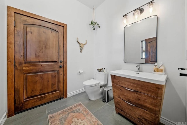 24949 Thunder Mountain Rd, Ramona, CA 92065 - bathroom with baseboards, toilet, vanity, and tile patterned flooring