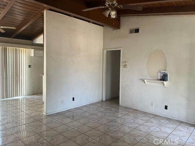 1320 N Grove Ave, Ontario, CA 91764 - unfurnished room featuring a ceiling fan, wood ceiling with exposed beams, high vaulted ceiling, and baseboards