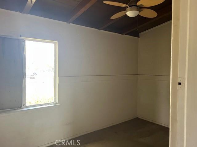 1320 N Grove Ave, Ontario, CA 91764 - spare room featuring healthy amount of natural light and a ceiling fan