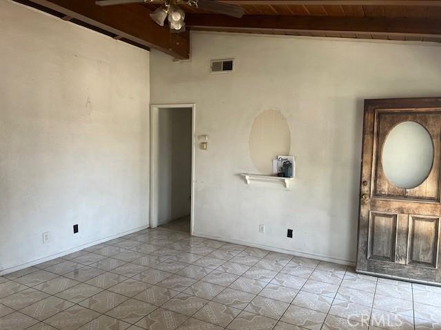 1320 N Grove Ave, Ontario, CA 91764 - unfurnished room with ceiling fan, wooden ceiling, and baseboards