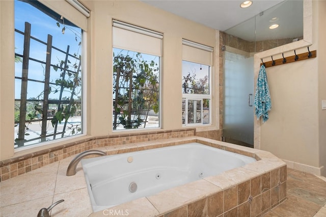 2913 Harris Dr, Vista, CA 92084 - bathroom featuring recessed lighting, a jetted tub, and walk in shower