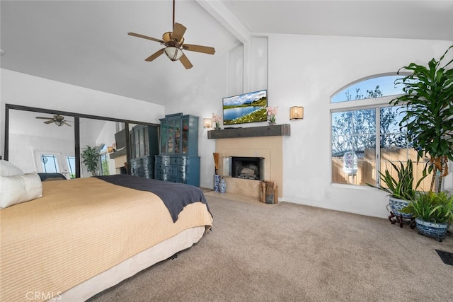 2913 Harris Dr, Vista, CA 92084 - carpeted bedroom featuring a fireplace with flush hearth, high vaulted ceiling, a ceiling fan, and beam ceiling