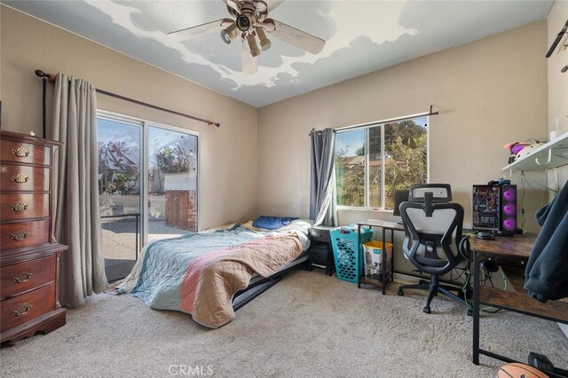 2913 Harris Dr, Vista, CA 92084 - bedroom with access to outside, a ceiling fan, carpet floors, and multiple windows