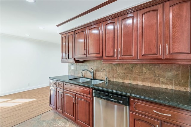 6160 Whitsett Ave Unit 6, North Hollywood, CA 91606 - kitchen with stainless steel dishwasher, a sink, dark stone counters, baseboards, and tasteful backsplash