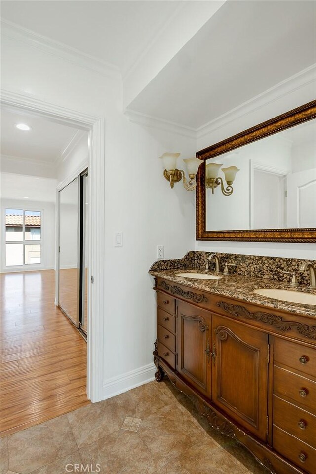 6160 Whitsett Ave Unit 6, North Hollywood, CA 91606 - bathroom featuring crown molding and double vanity