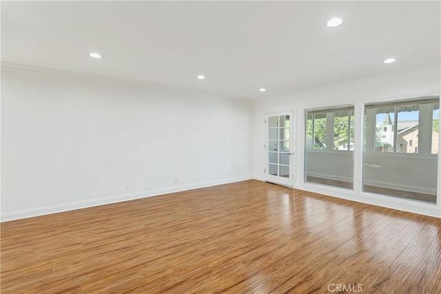 6160 Whitsett Ave Unit 6, North Hollywood, CA 91606 - unfurnished room with crown molding, light wood-style floors, recessed lighting, and baseboards
