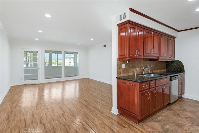 6160 Whitsett Ave Unit 6, North Hollywood, CA 91606 - kitchen with stainless steel dishwasher, crown molding, tasteful backsplash, recessed lighting, and light wood finished floors