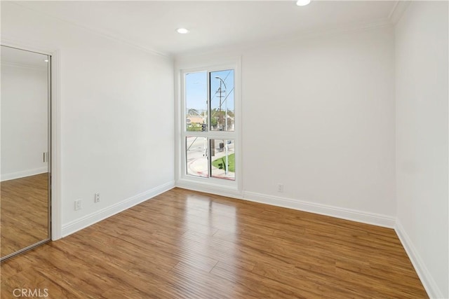 6160 Whitsett Ave Unit 6, North Hollywood, CA 91606 - spare room featuring crown molding, wood finished floors, baseboards, and recessed lighting