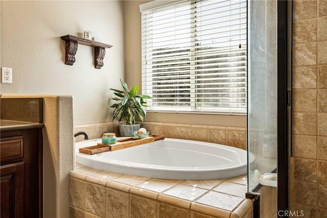 full bathroom with a garden tub